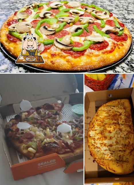 Попробуйте пиццу в "Pizza Pizza"