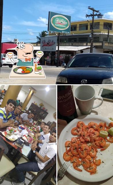 Dê uma olhada a foto apresentando comida e exterior no Bom Sabor