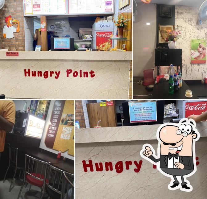 Take a seat at one of the tables at Hungry Point - Jalandhar Model House