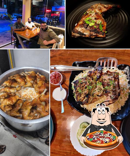 Try out pizza at Fat Chef Mandi Village