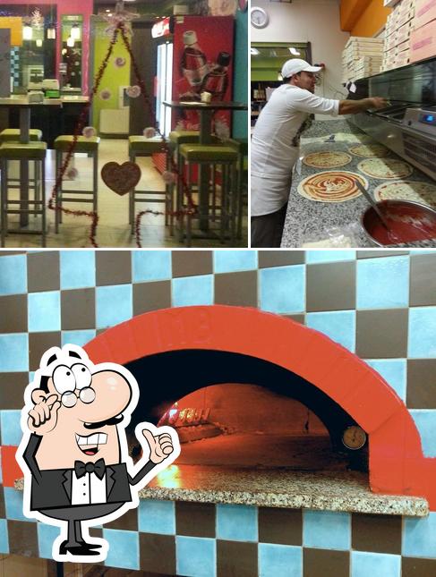 Gli interni di Pizza San Luigi e San Pietro