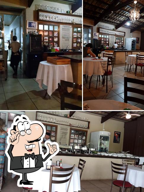 O interior do Geppetto Pizzaria