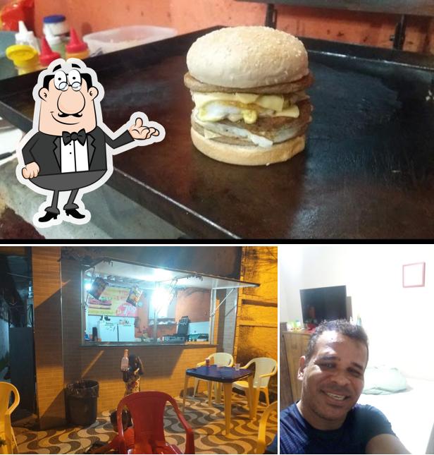 A ilustração do Lanches do Marquinho’s interior e cidadãos