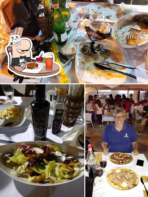 La foto della tavolo da pranzo e alcol di I Cabrera