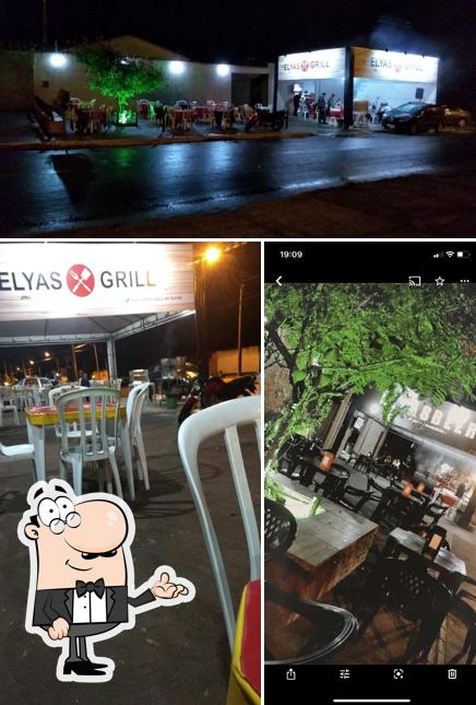 Sente em uma das mesas no Elyas Grill ( jantinhas, espetinhos, caldos, porções, petiscos, bebidas)