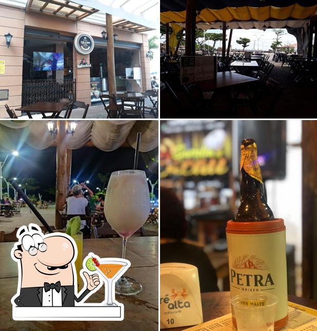 Take a look at the photo depicting drink and interior at O Mais Amado Boteco