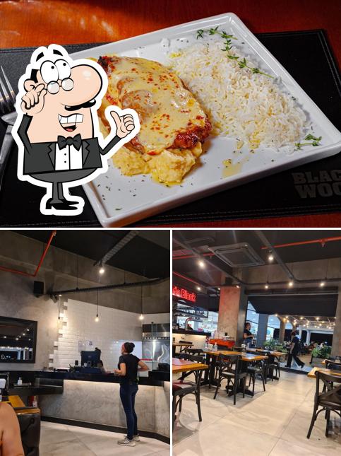 Confira a ilustração ilustrando interior e comida no Restaurante Black Wood Shopping Piratas Angra dos Reis RJ