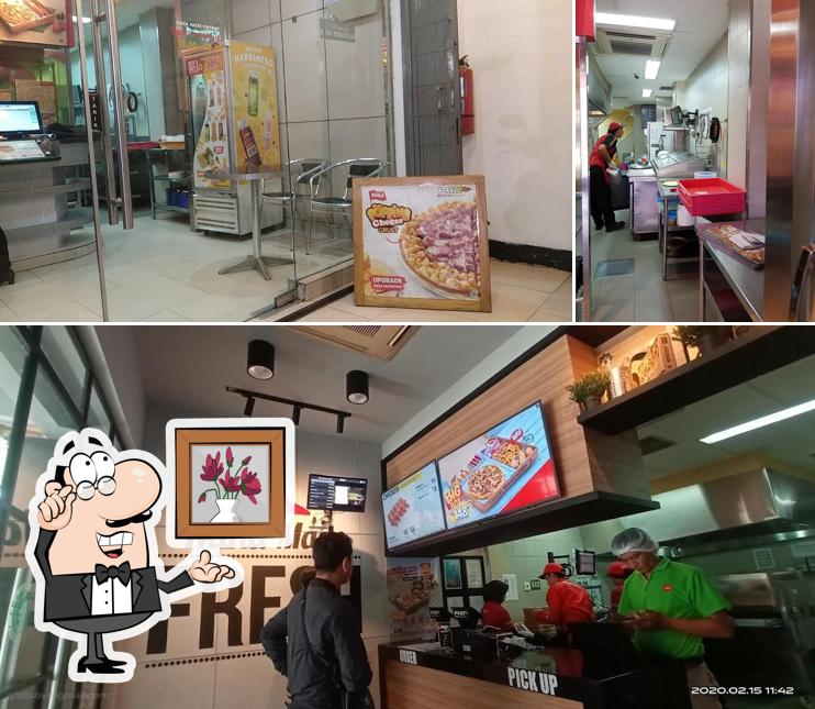 El interior de Pizza Hut Delivery - PHD Indonesia