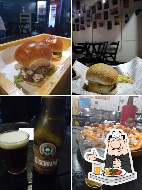 Dê uma olhada a ilustração mostrando comida e bebida no Saloon Burger Bar