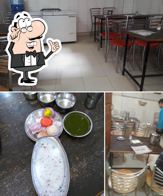 Among different things one can find interior and food at Chopra Vaishno Bhojnalaya