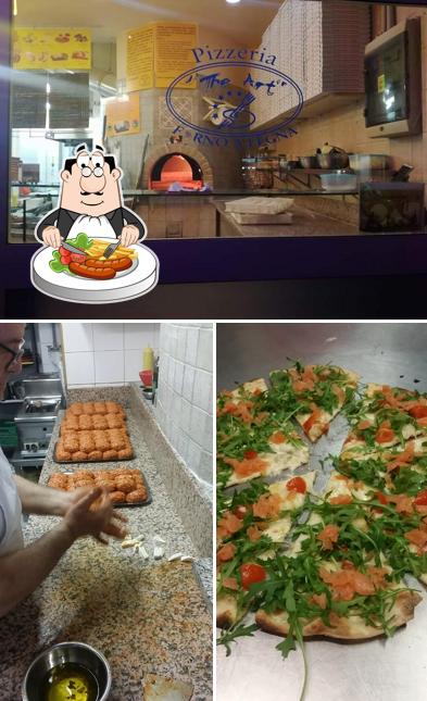 Tra le varie cose da Pizzeria THE ART si possono trovare la cibo e interni