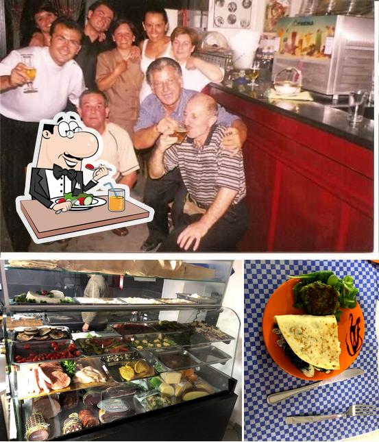 Dai un’occhiata alla foto che raffigura la cibo e interni di Oasi Bar Pasticceria