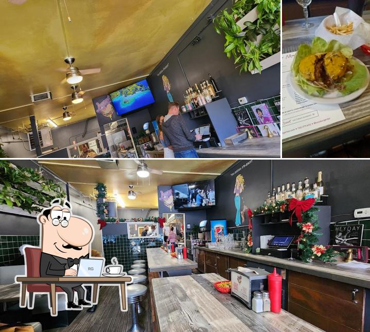 Check out the photo showing interior and food at Lucy's Burger Bar