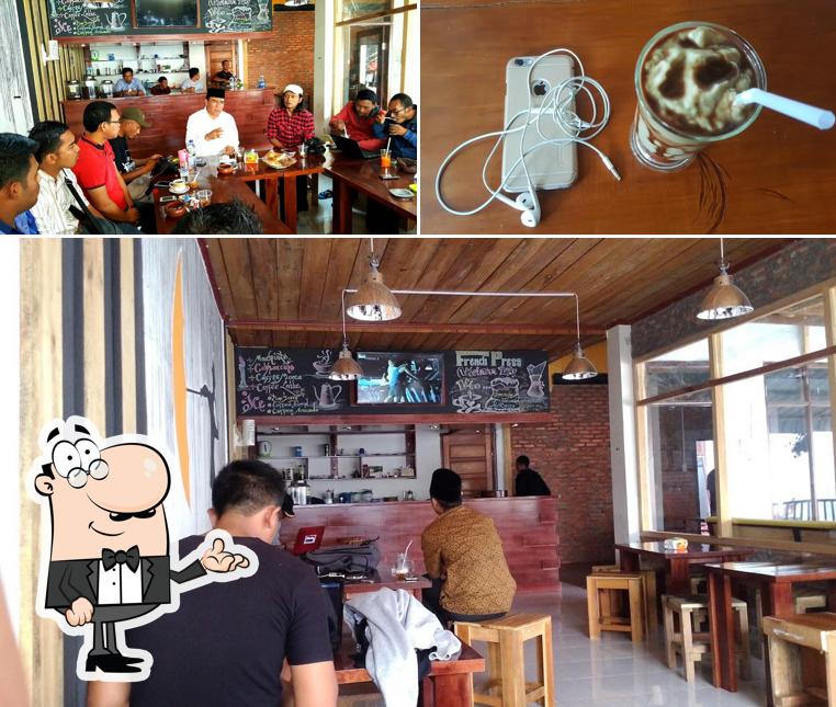 Among various things one can find interior and beverage at Lumbung Kopi ( Coffee Shop )