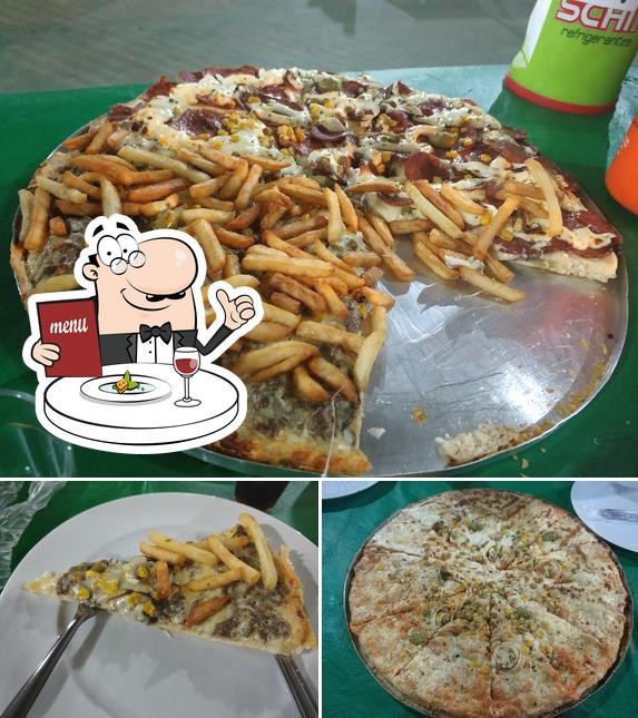 Comida em Pizzaria Bigness