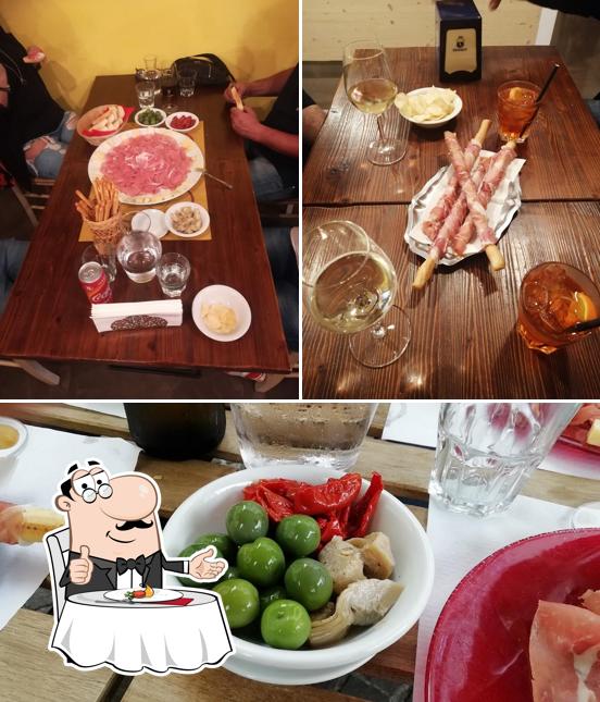 Voici l’image représentant la table à manger et nourriture sur Al San Daniele