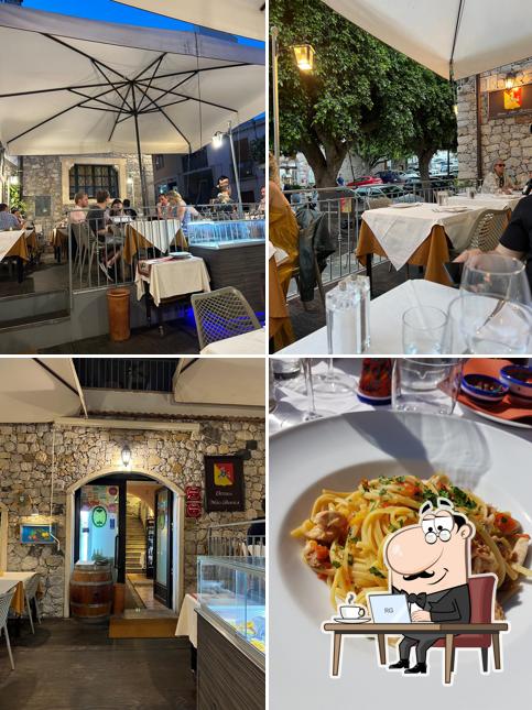 Dai un'occhiata agli interni di Osteria Nero d'Avola