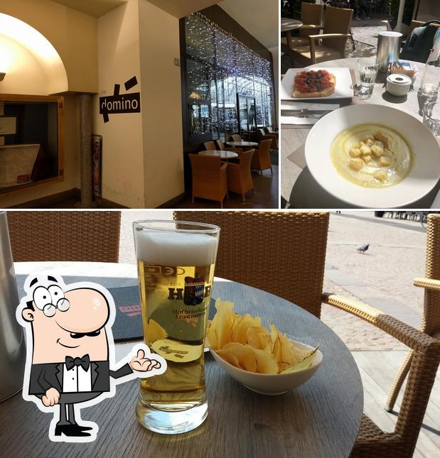La foto della interni e birra di Domino Bistrò