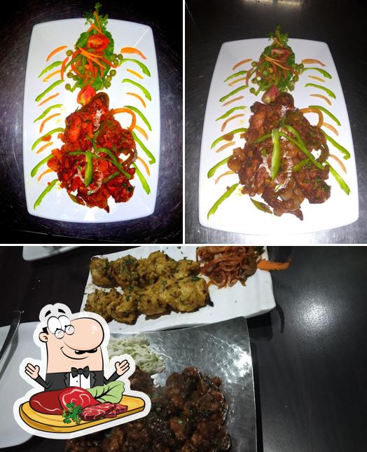 Try out meat meals at Excellent Bar and Restaurant