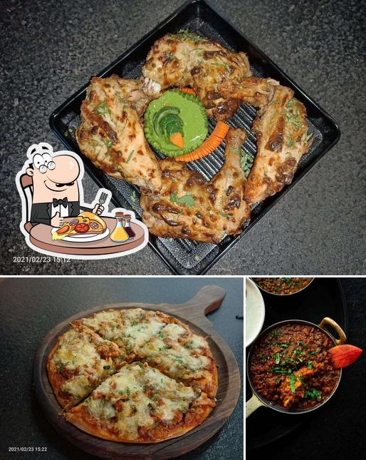 Get pizza at Cheeni Kum Restaurant - Kasba