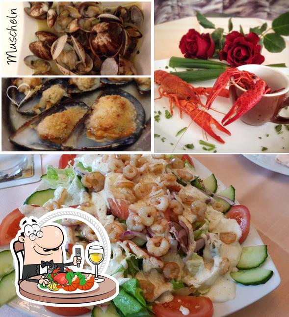 Попробуйте блюда с морепродуктами в "Pizzeria Calimero - Café, Bar, Mercatino - Ansbach/Windmühle"