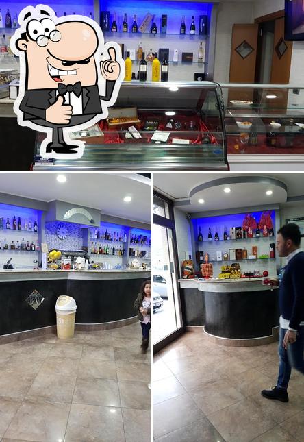 Look at the photo of Real Bar