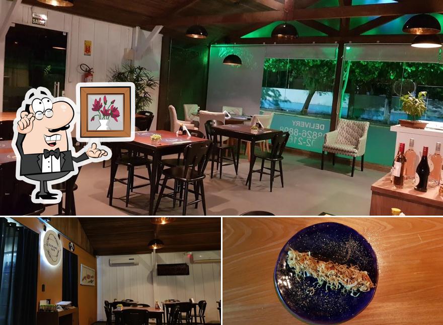 Confira a foto mostrando interior e comida no Gurmesan Sushi