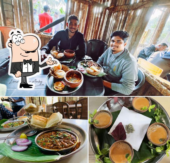 Among different things one can find interior and beverage at Lopes Shetkari dhaba