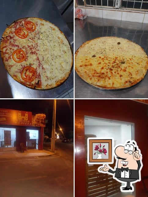 Entre diferentes coisas, interior e comida podem ser encontrados no CASTELO DA PIZZA