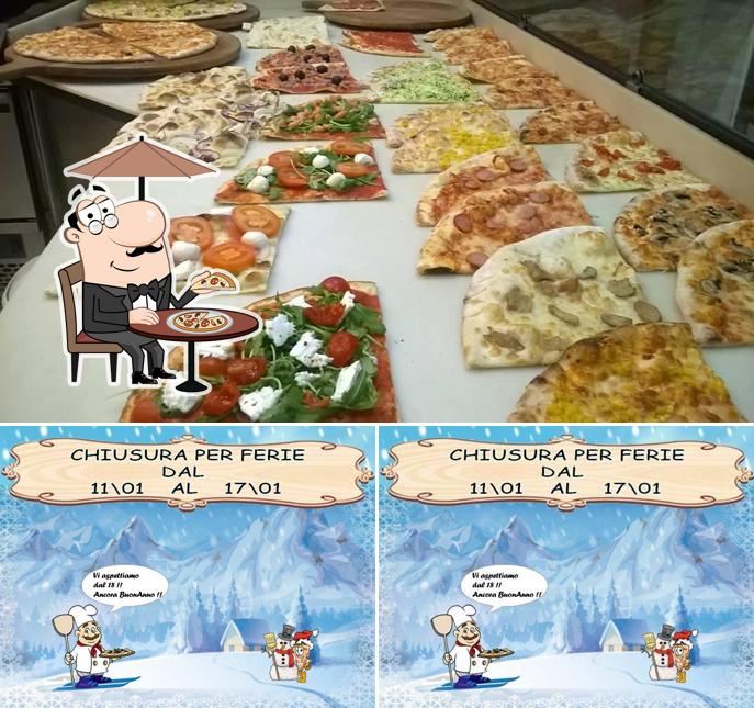 La extérieur et pizza du restaurant