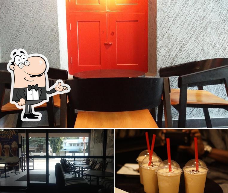 The photo of Café Coffee Day’s interior and beverage