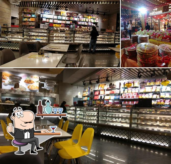 Take a seat at one of the tables at Bikanervala Lal kuan Ghaziabad