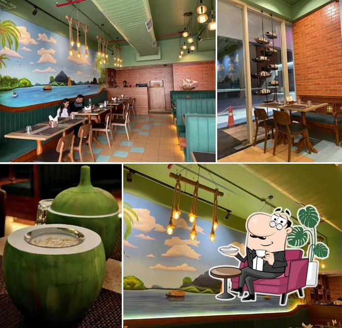 Take a seat at one of the tables at The Malabar Coast