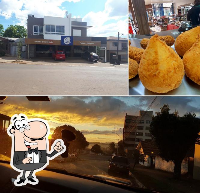 A foto da exterior e comida no Cia Do Pão