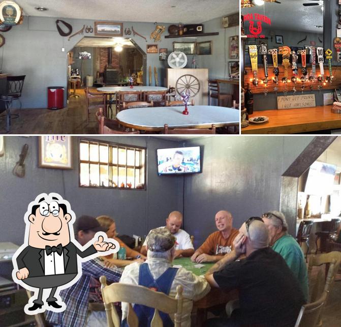 Check out the picture displaying interior and beverage at Watering Hole Of America - W.H.O.A. Tavern
