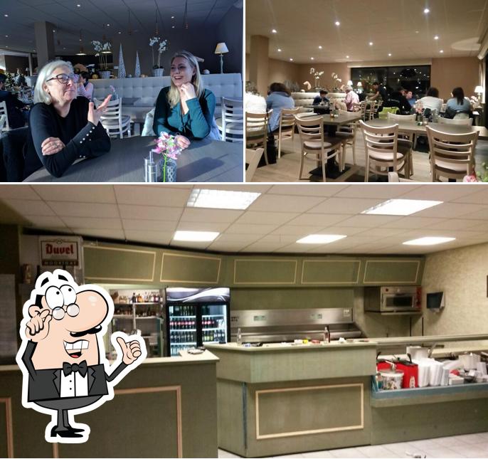 Installez-vous à l'une des tables de Frituur Eric