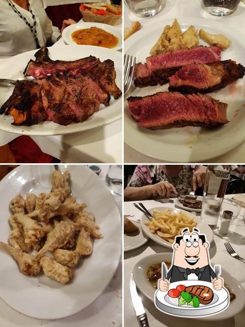 Prenditi i un pasto a base di carne a Trattoria Osvaldo
