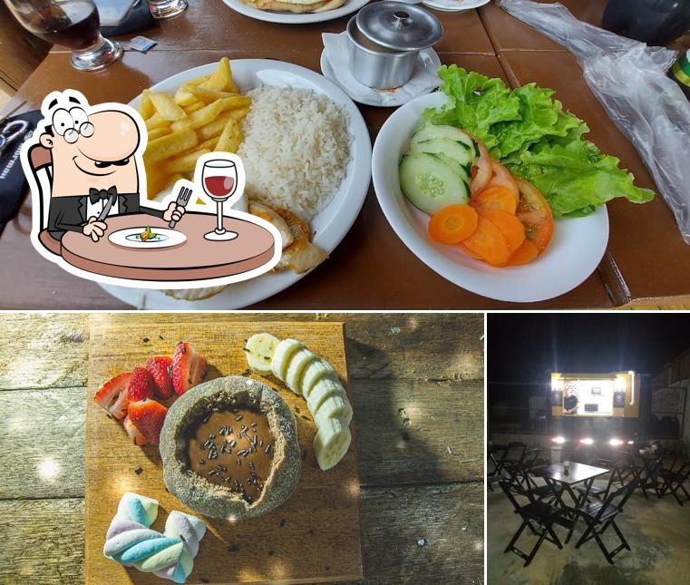 A imagem a Flor de Zuca’s comida e interior