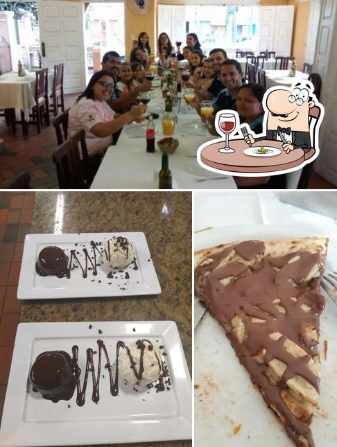 A foto da comida e interior no Pizzaria Reis Magos