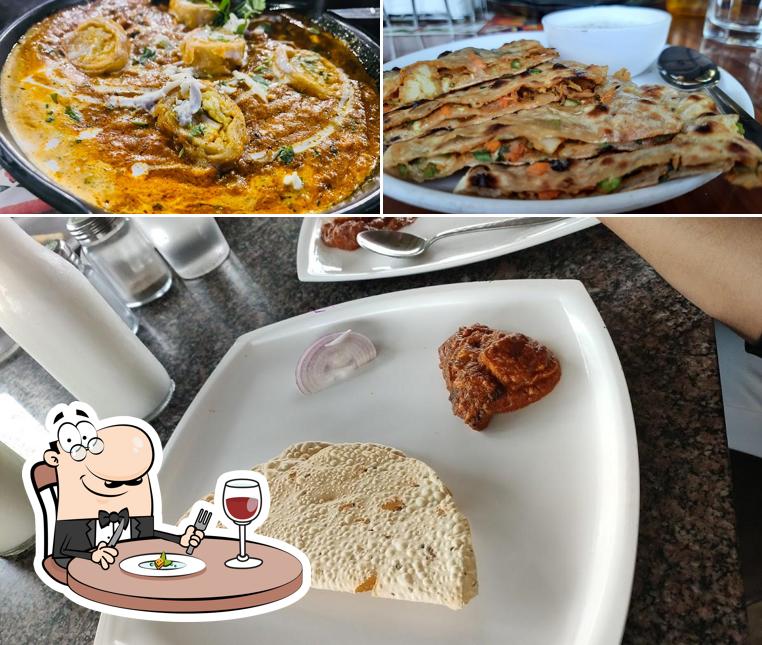 Food at Aarya Grand Hotels & Resorts Horn Ok Please Restaurant