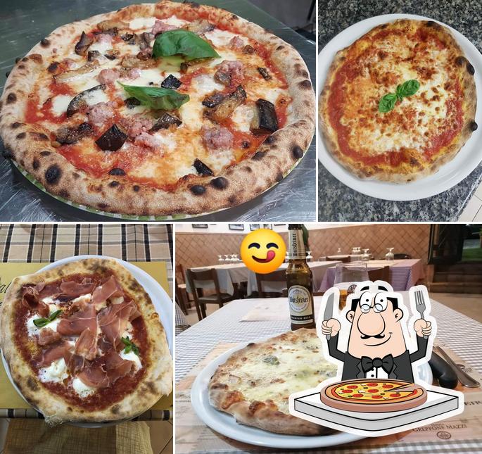 Prenditi una pizza a Al Caminetto