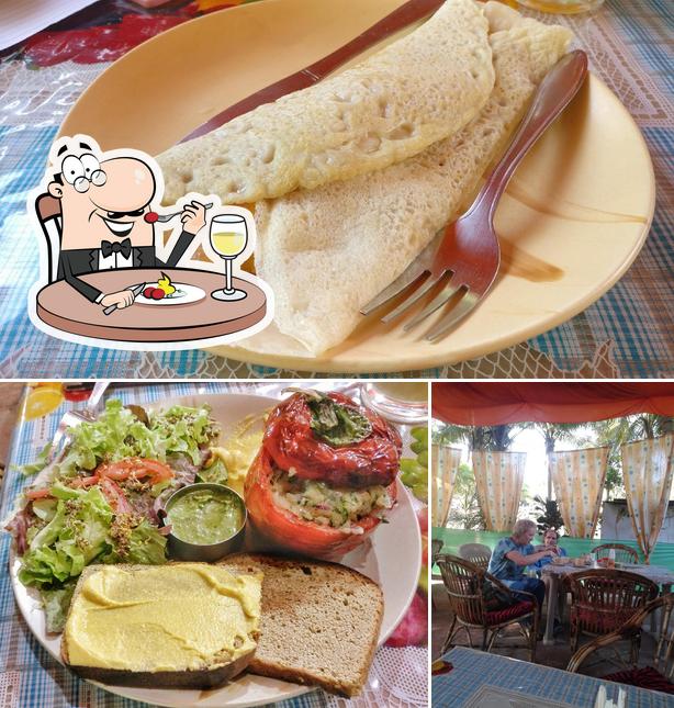 Take a look at the image showing food and interior at Agonda Nature Organic Vegan Restaurant