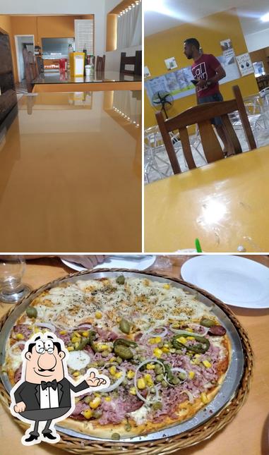 A imagem da interior e pizza a Dom Manuel Restaurante e Pizzaria