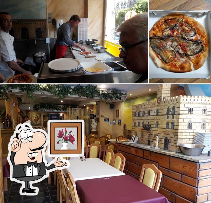 Parmi les diverses choses de la intérieur et la pizza, une personne peut trouver sur Michelangelo - Restaurant & Pizzeria Congés annuels jusqu’au 8/09 inclus