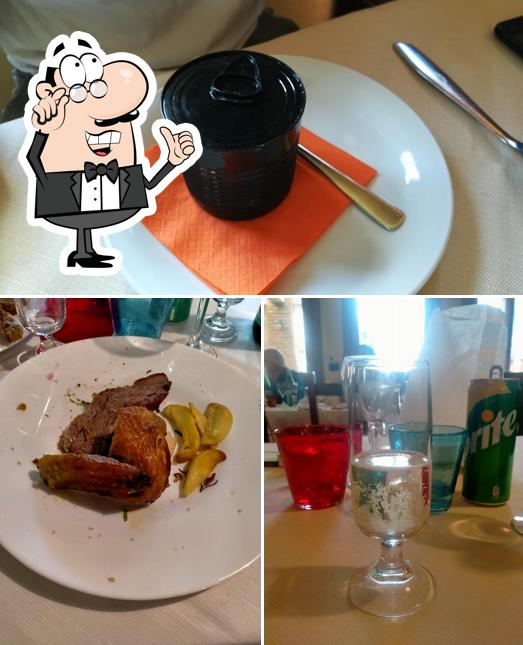 Tra le diverse cose da Ristorante La Collina Fraccano si possono trovare la interni e cibo