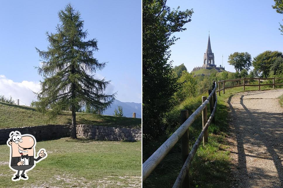 Puoi goderti l'aria fresca da seduto all'esterno di Chalet Pineta