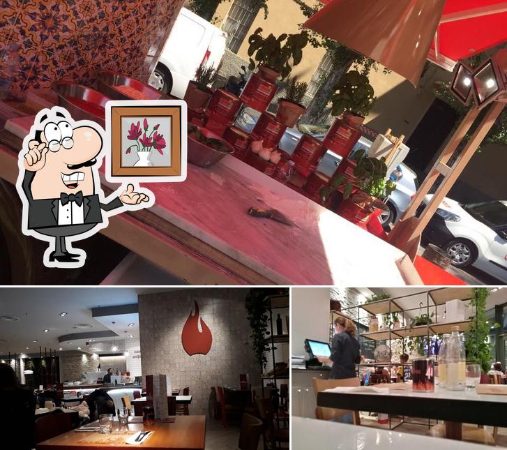Dai un'occhiata agli interni di Pizzeria Fuocopuro