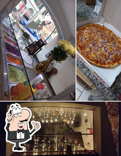 La immagine di interni e cibo da pizza & kebab städtli