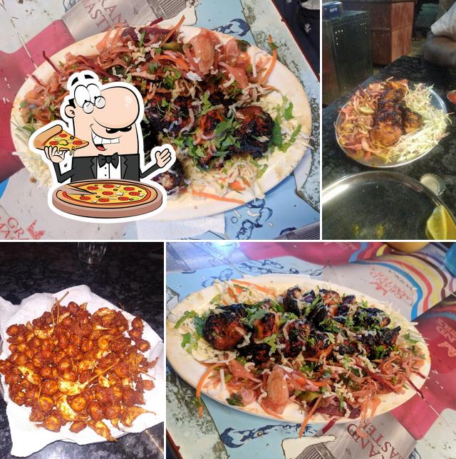 Get pizza at Sachin Hotel