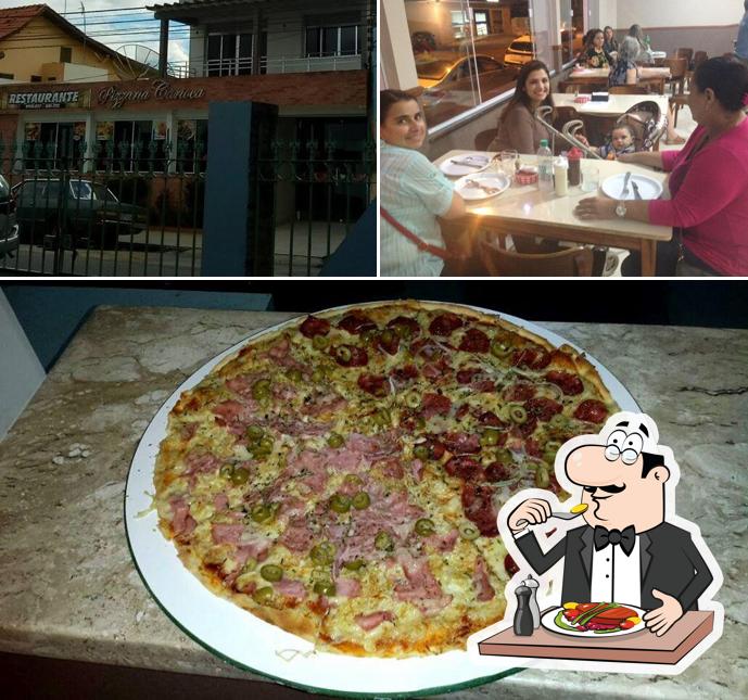 A foto da comida e exterior a Pizzaria Carioca